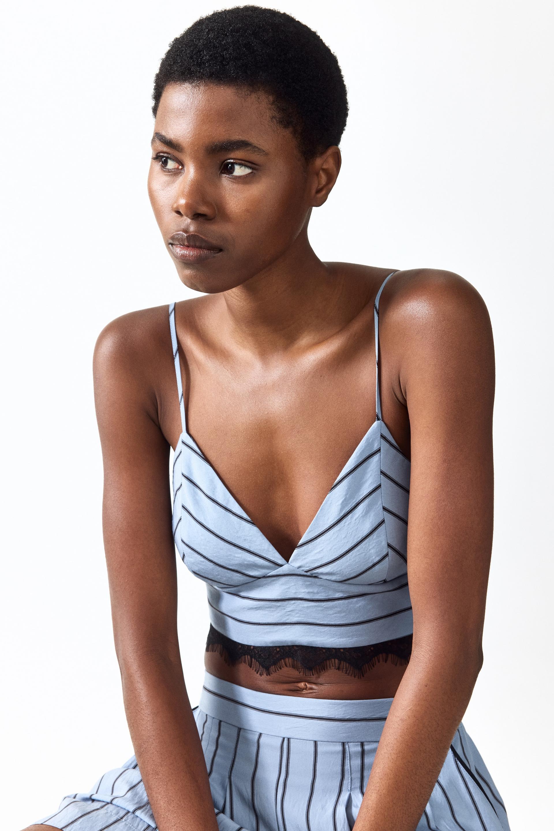 lace-trimmed crop top