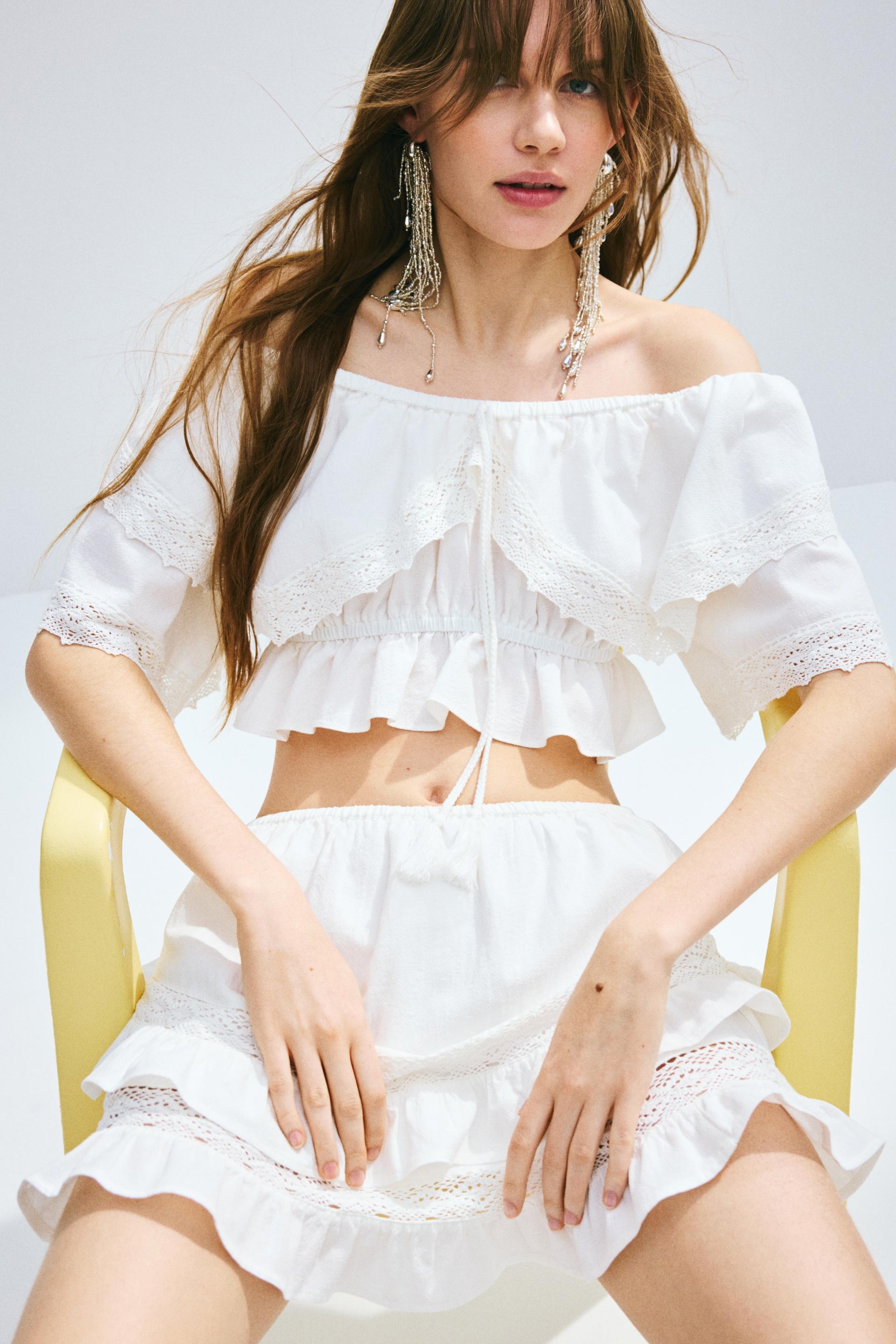 lace-trimmed crop top