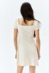 lace-trimmed dress with flared skirt
