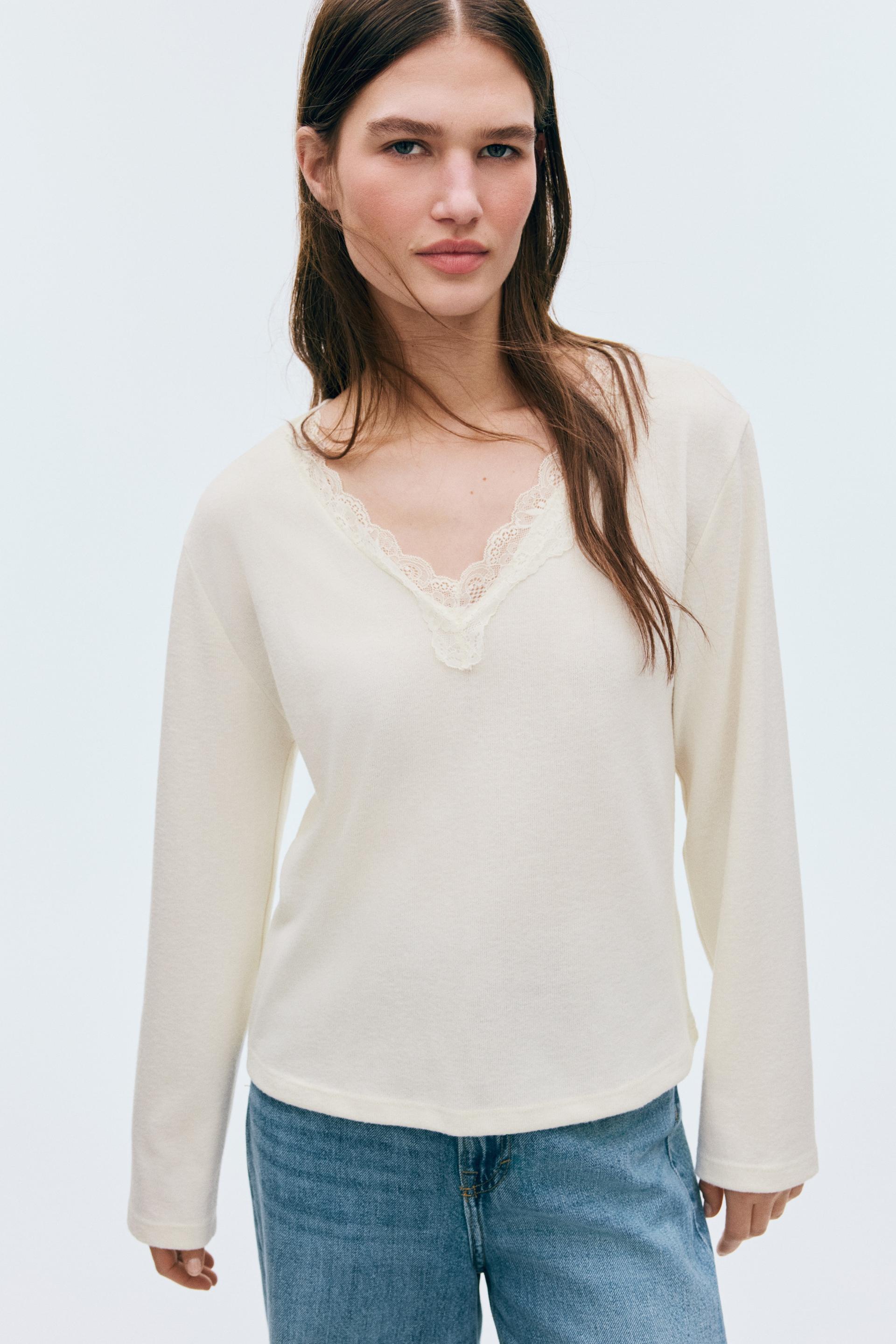 lace-trimmed knit top