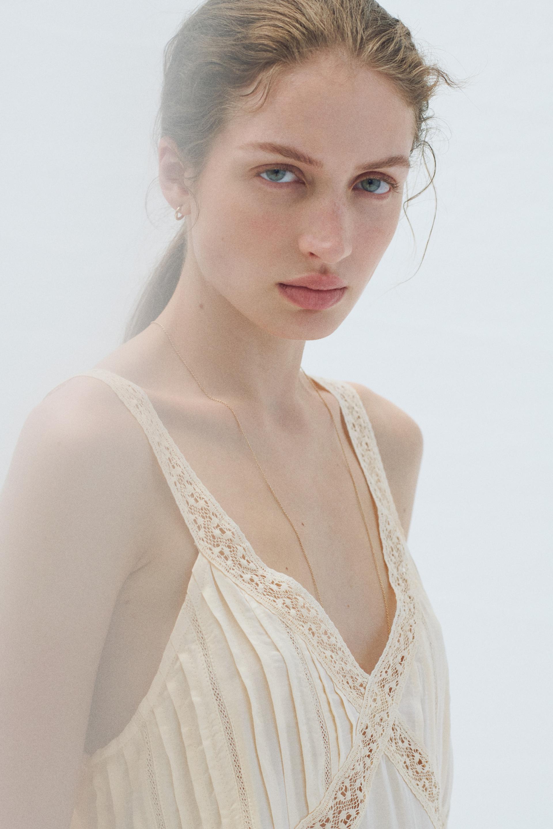 lace-trimmed pintucked top
