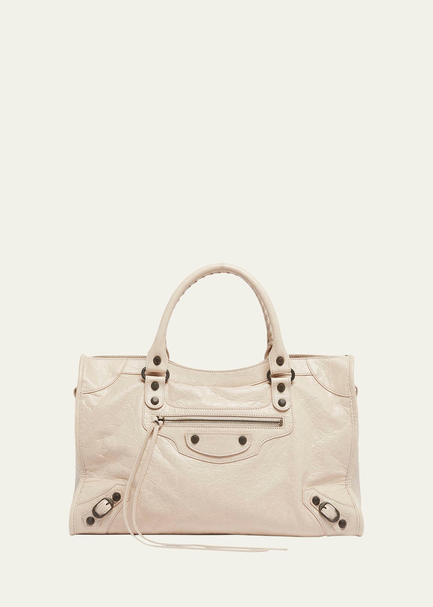 le city medium leather top-handle bag