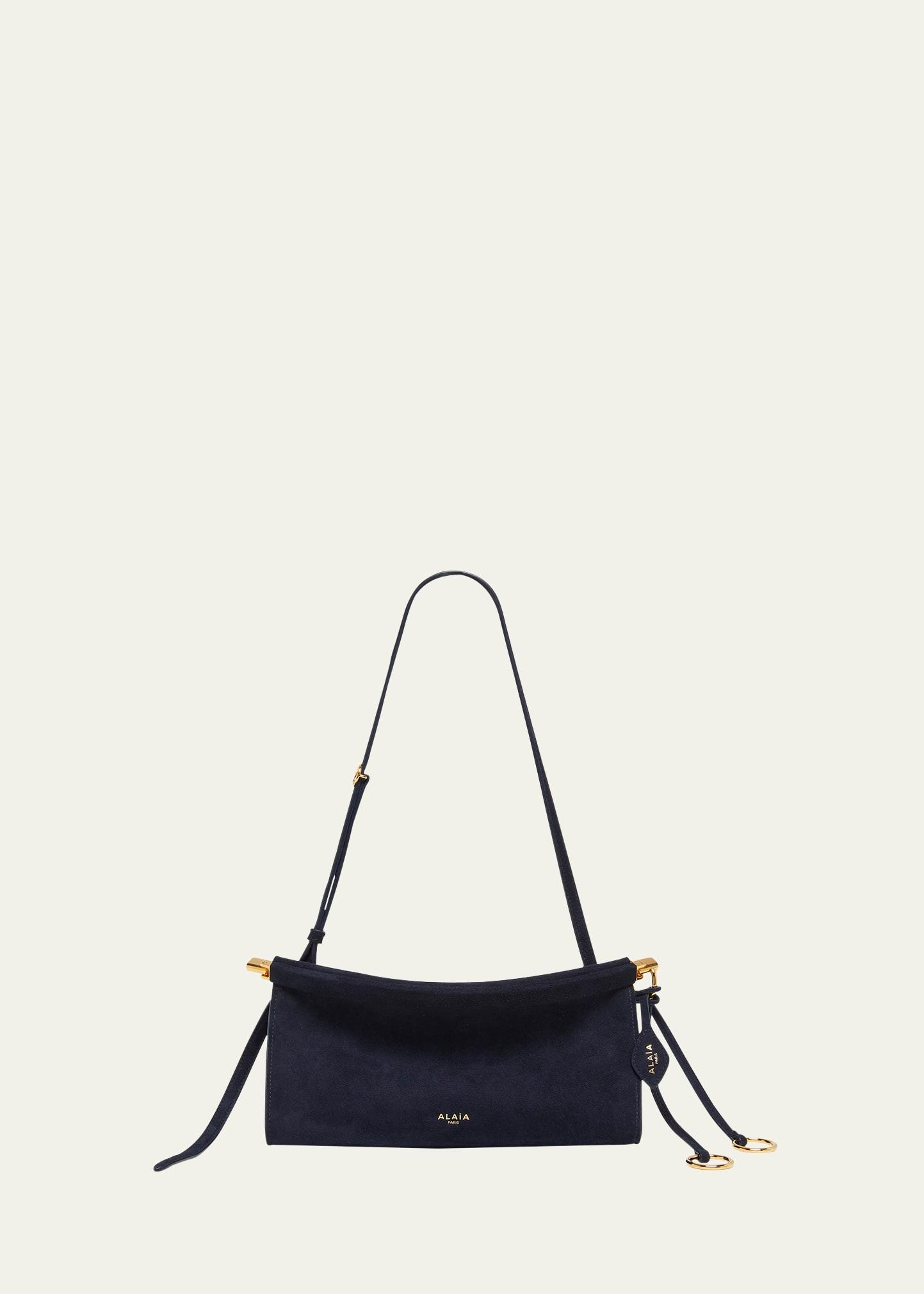 le click east-west suede shoulder bag