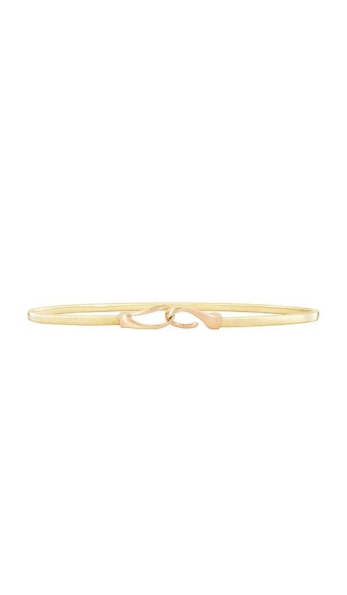 lele sadoughi stretch chain belt in metallic gold.