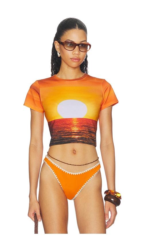 leslie amon t shirt in orange.