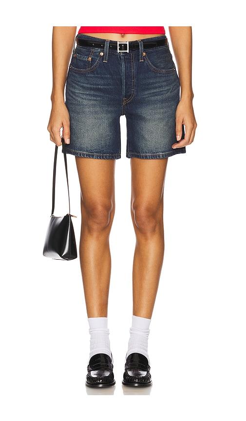 levi's 501 mid thigh low waist short in blue.