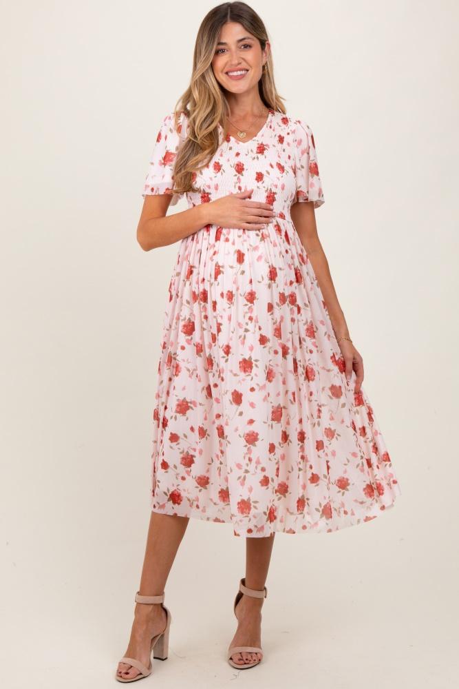 light pink floral smocked v-neck maternity midi dress