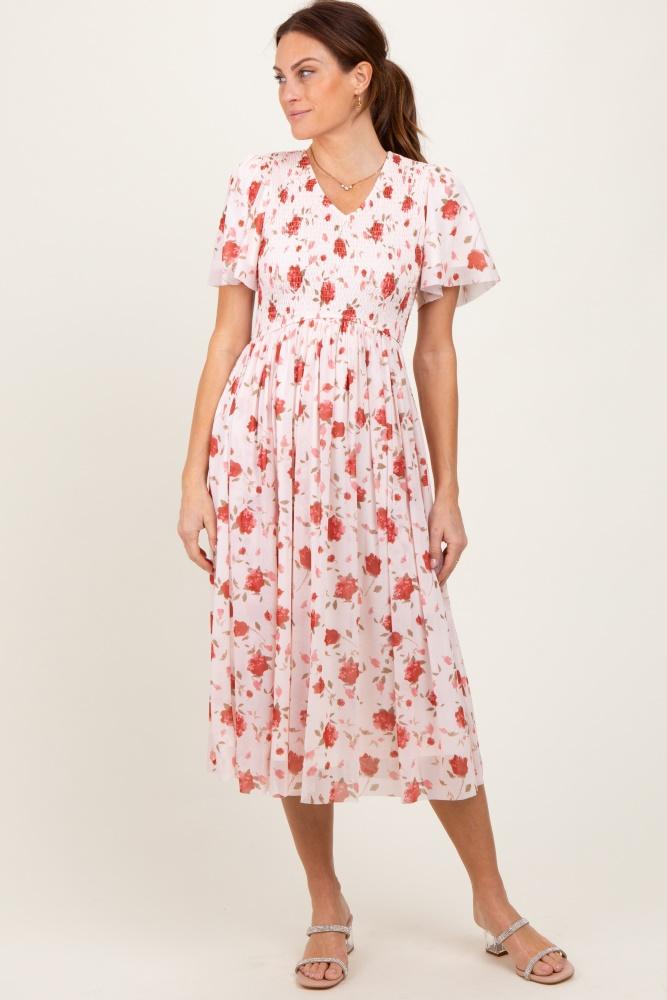 light pink floral smocked v-neck midi dress