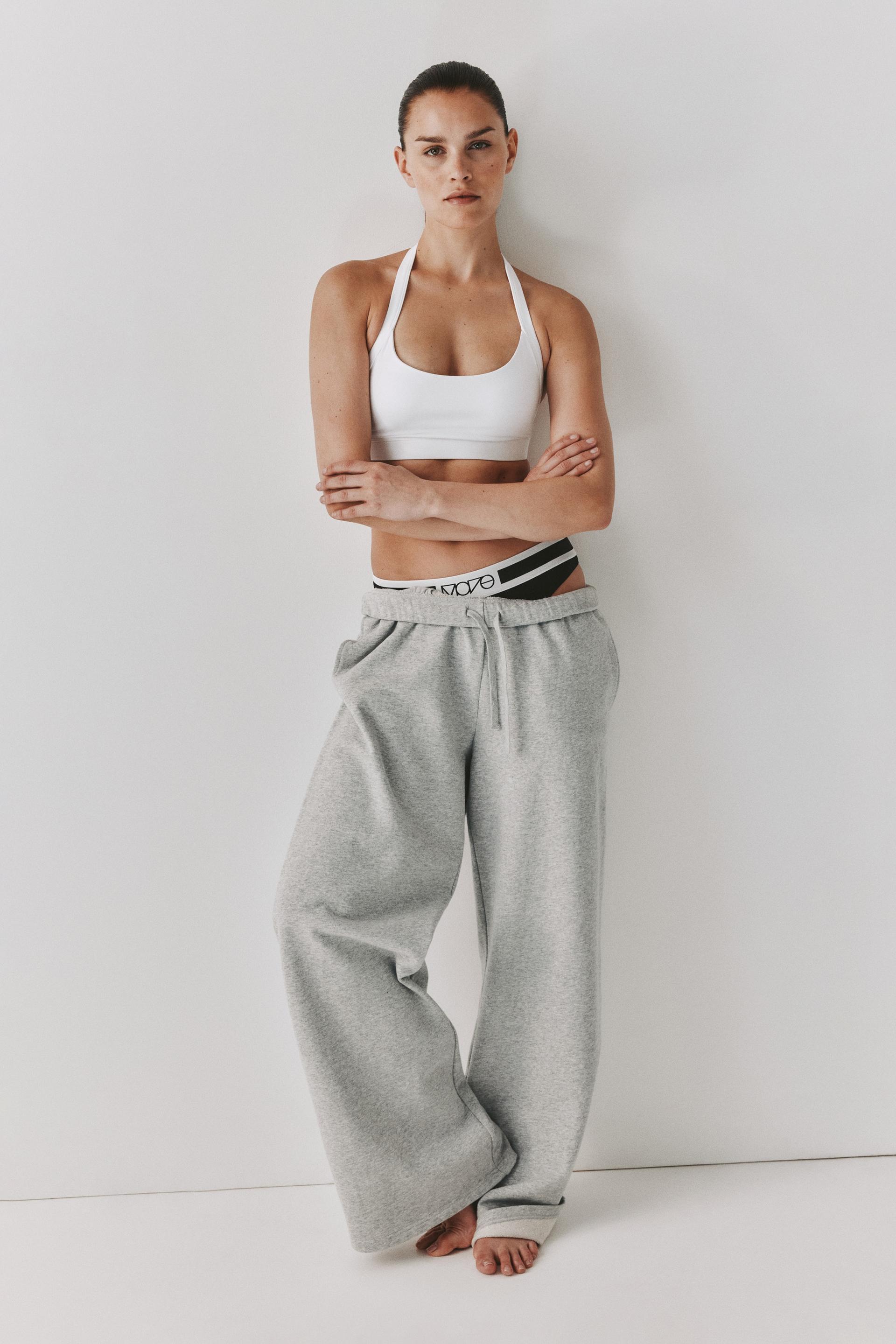 light support halterneck sports bra with softmove™