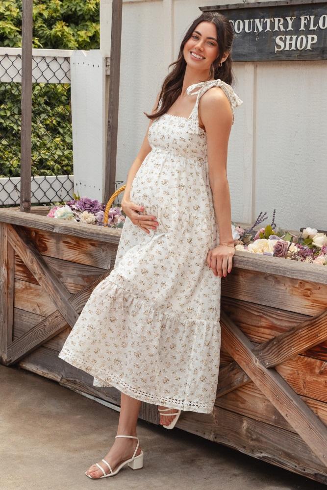 light yellow floral shoulder tie maternity midi dress