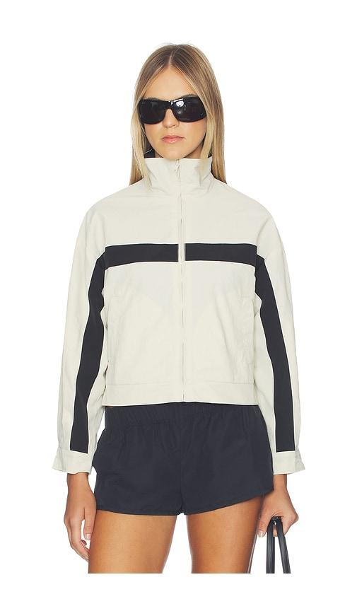lioness essential windbreaker in beige.