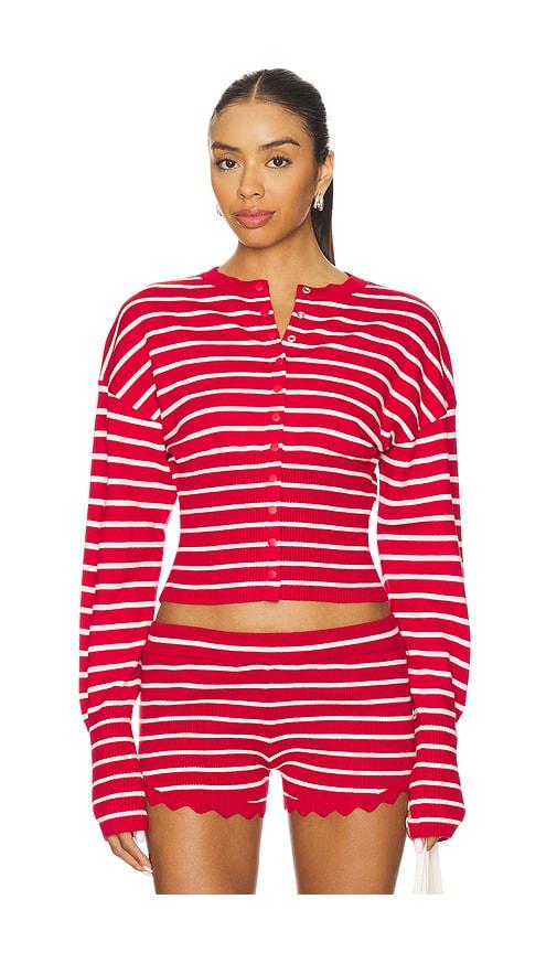 lioness head in the clouds cardigan in red.