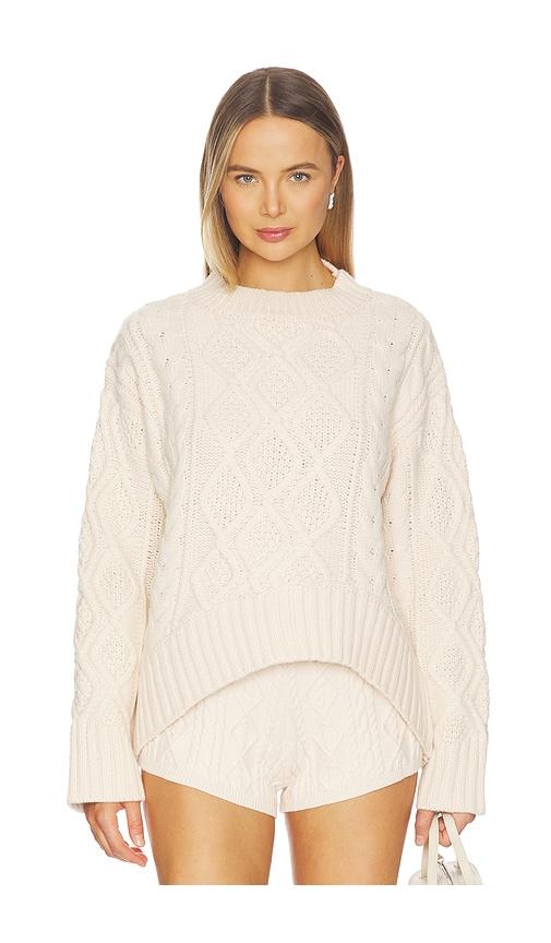 lioness liaison cable knit pullover in cream.