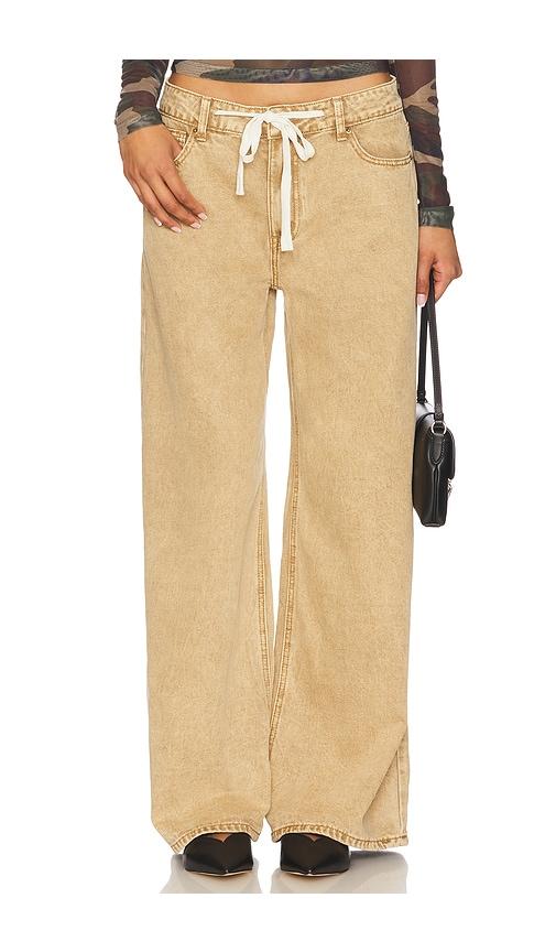 lioness muse jean in tan.