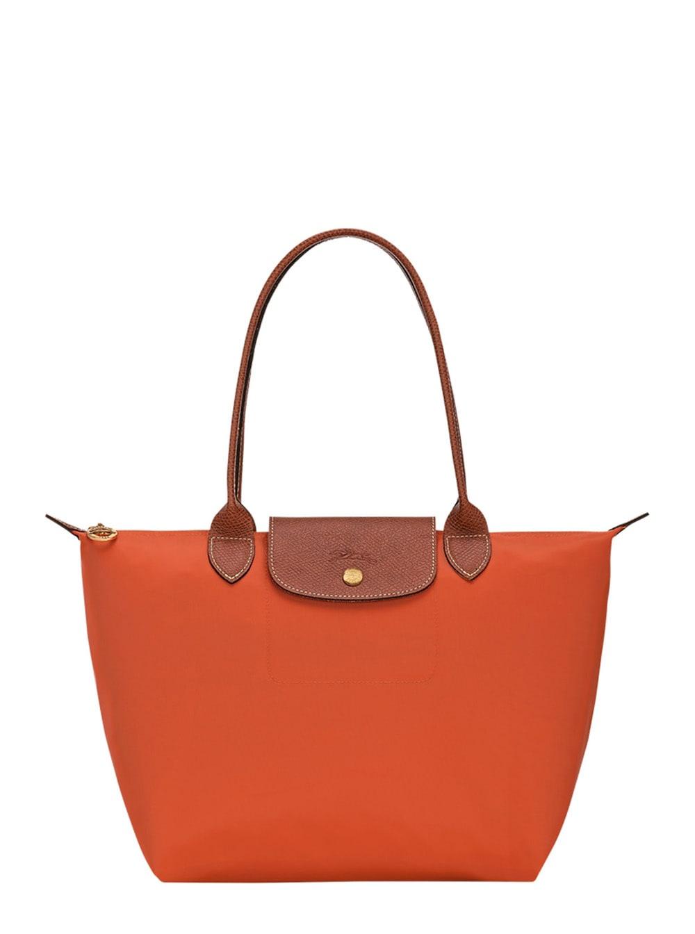 longchamp le pilage original red medium tote bag with two top handles and embossed logo on the front in canvas woman