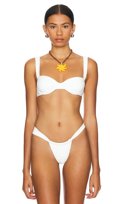 lovers and friends chasing sunsets top in white.