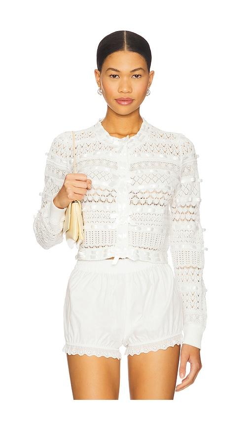 loveshackfancy roselline cardigan in white.