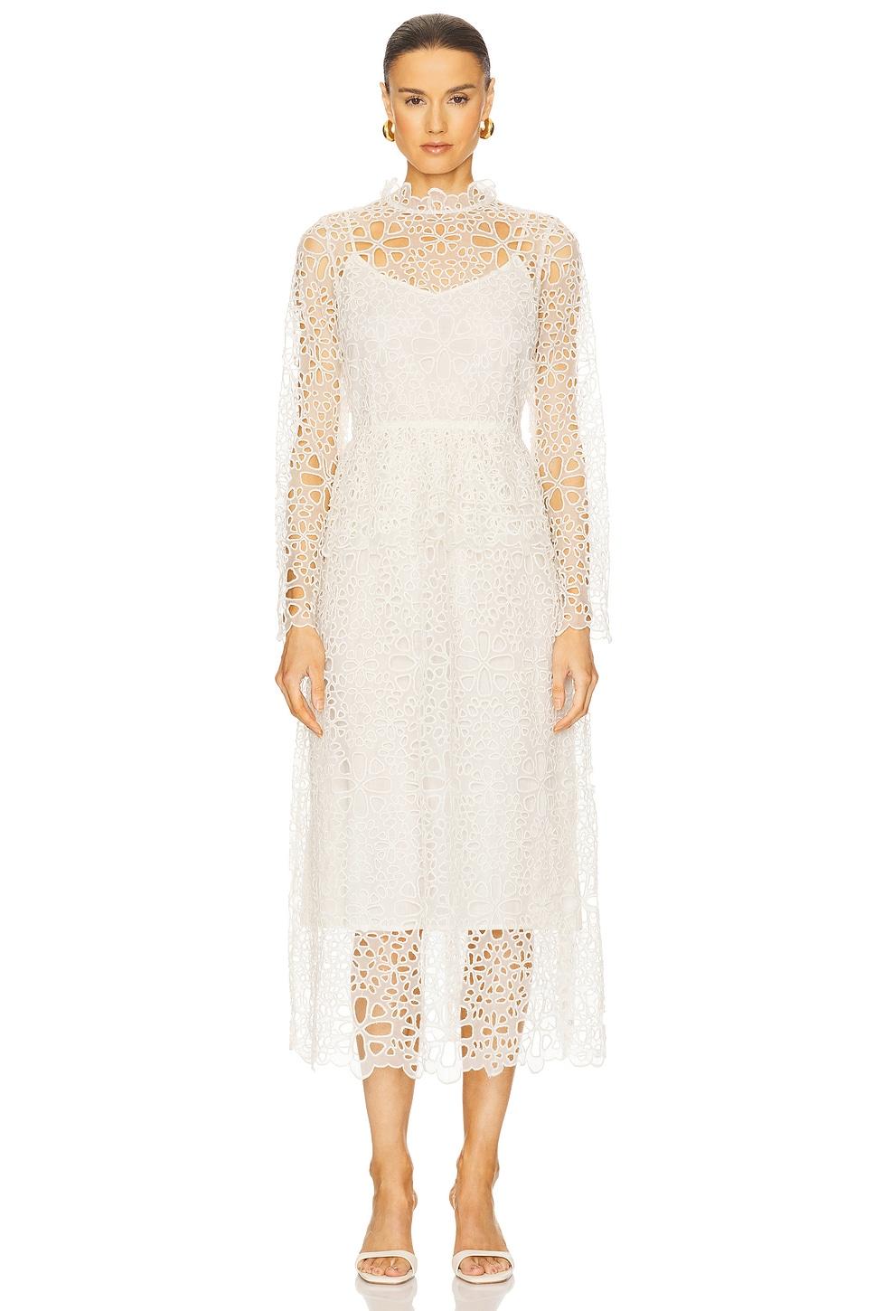 lumi eyelet peplum long sleeve dress