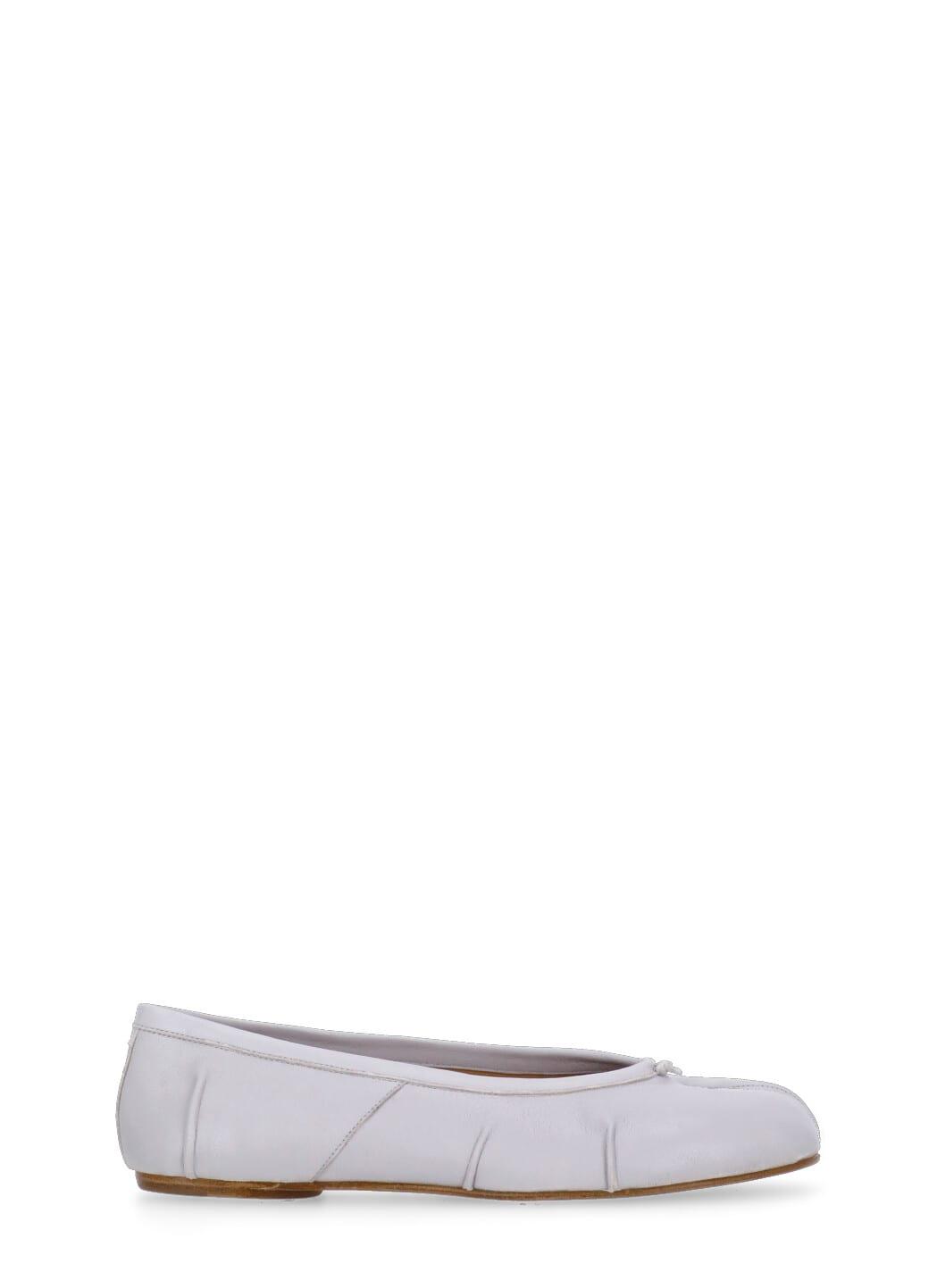 maison margiela white ballet flats with tabi toe and bow detail on front in leather woman