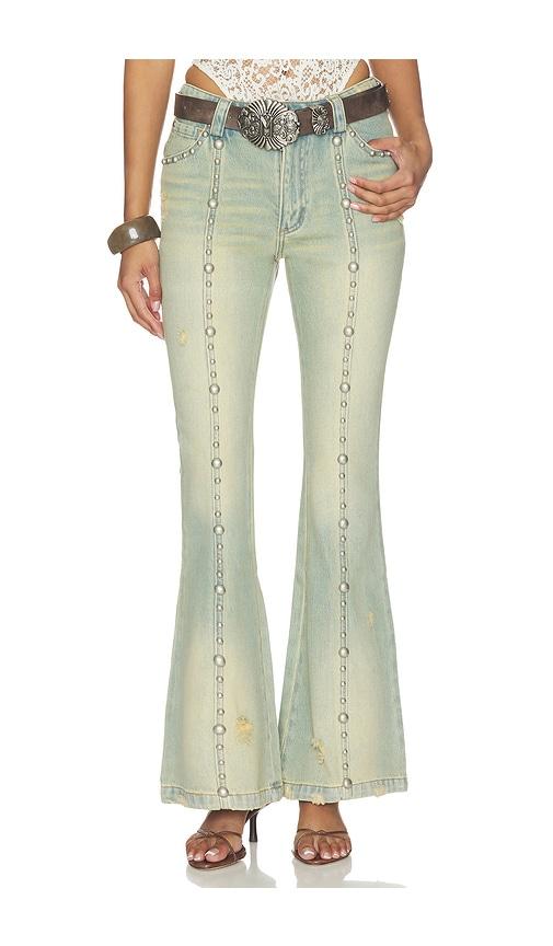 markgong studded flared jeans in blue.