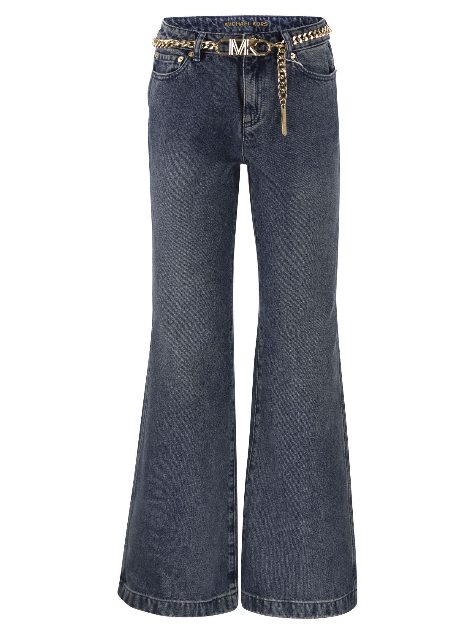 michael kors flared jeans with chain belt