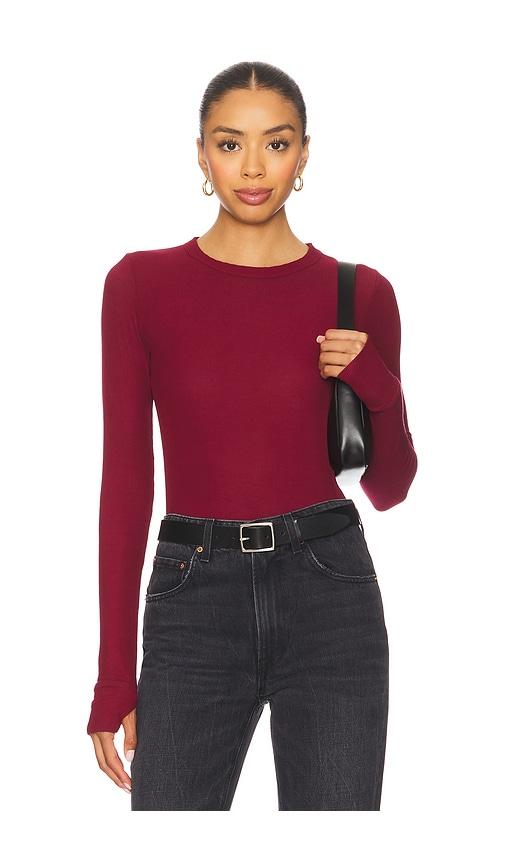 michael lauren alick long sleeve fitted top in burgundy.