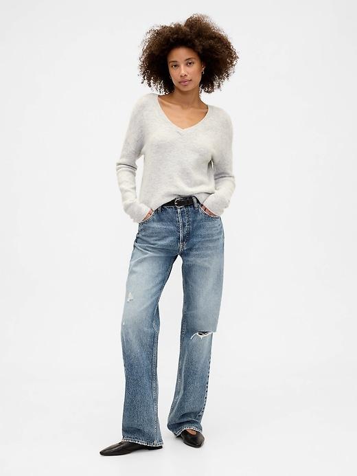 mid rise destructed relaxed straight jeans