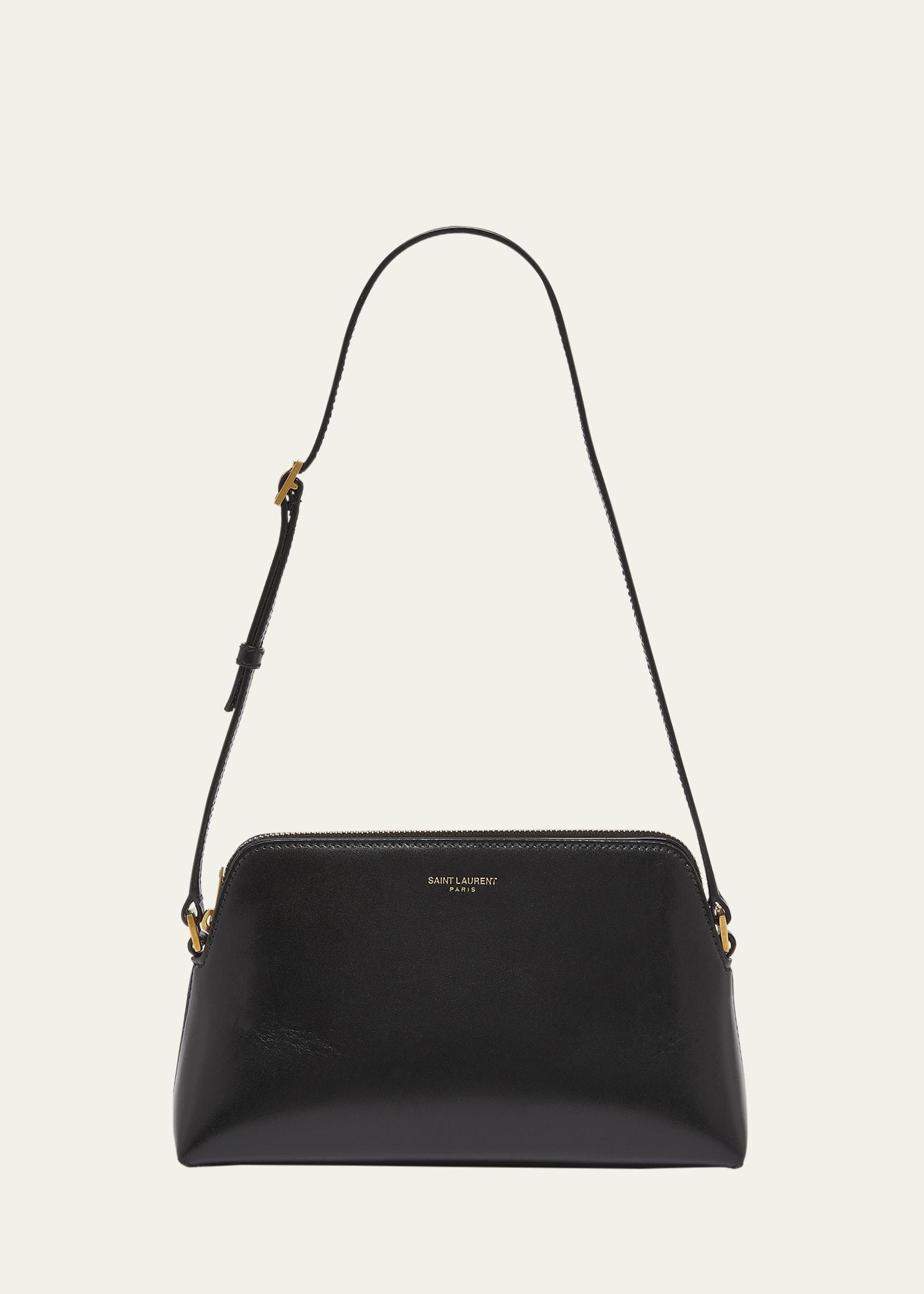 mini pouch on strap shoulder bag in leather