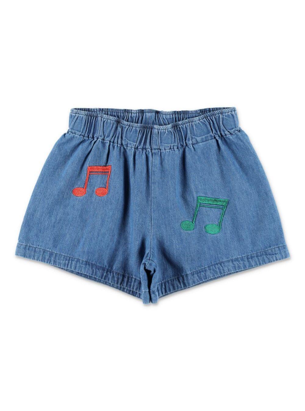 mini rodini blue shorts with elastic waist and music notes embroidery on the front in denim girl