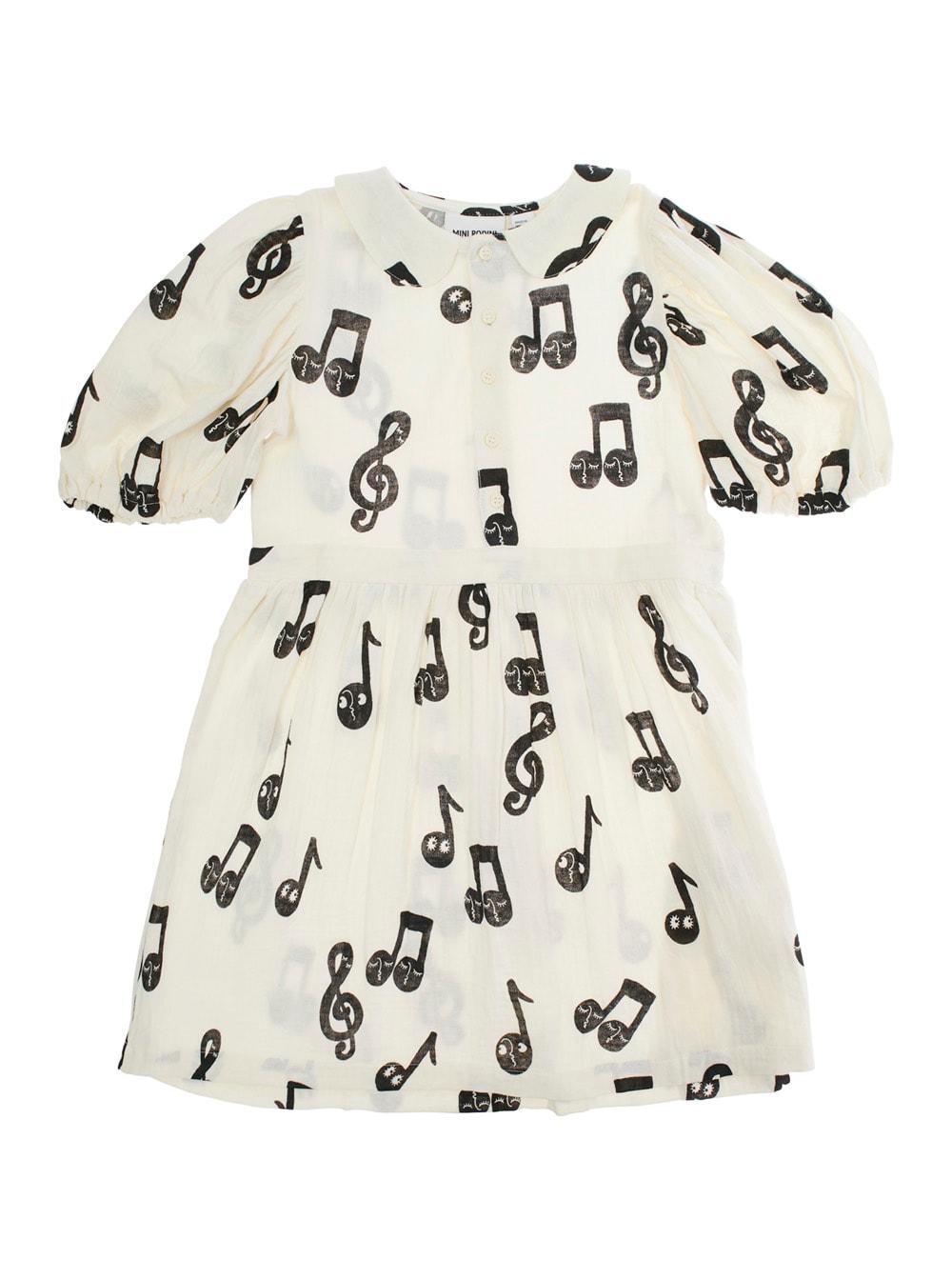 mini rodini white dress with all-over printed musical notes in cotton girl