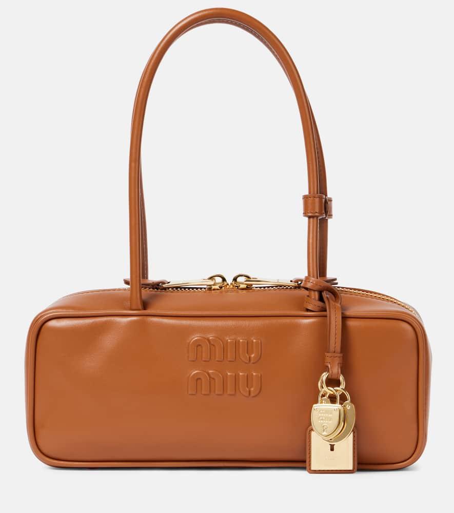 miu miu beau logo embossed leather tote bag