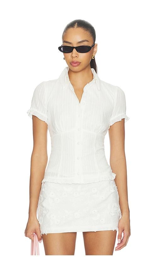 more to come abril button up top in white.