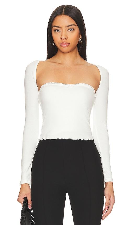 more to come vera shrug set in white.