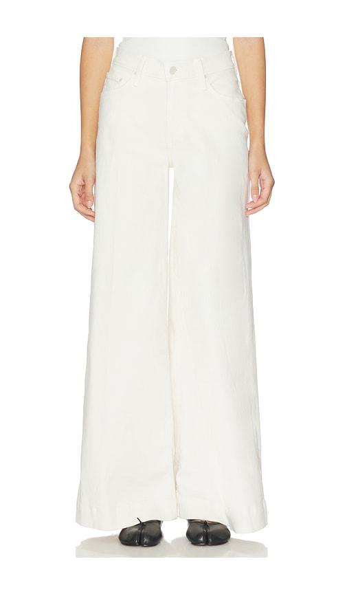 mother the mid rise headliner sneak jeans in cream.
