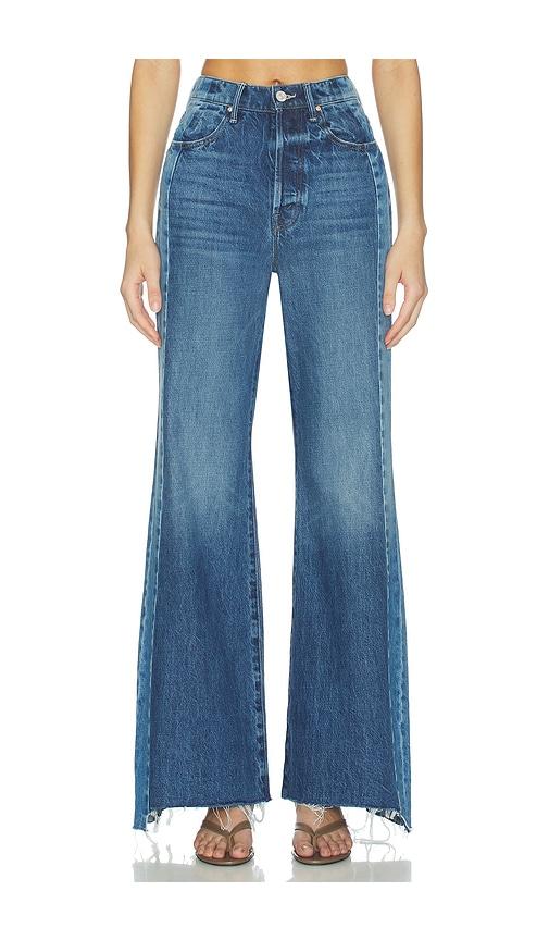 mother the tux sidestepper sneak fray jeans in blue.