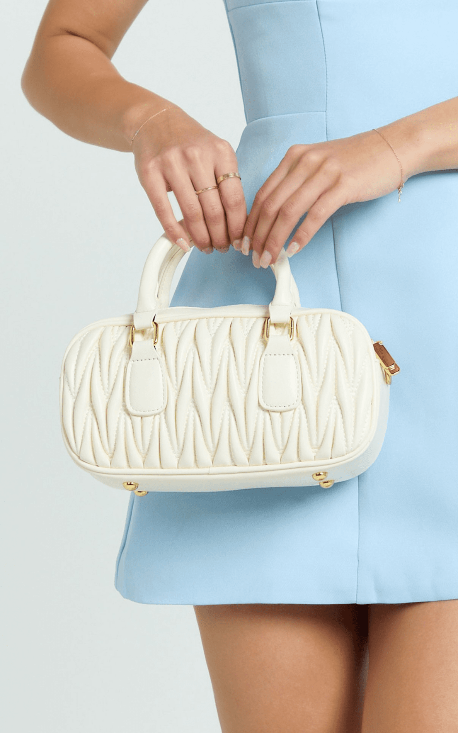 myra bag - cross body camera bag in cream