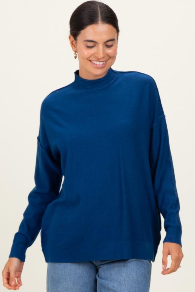 navy mock neck exposed seam sweater