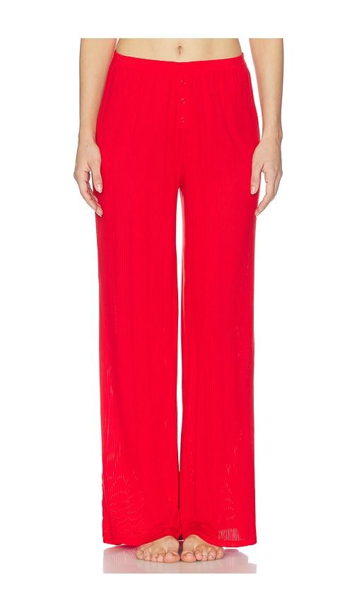 negative underwear whipped track pant in red.