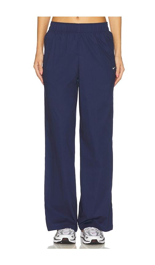 nike chill poplin high waisted open hem pant in navy.
