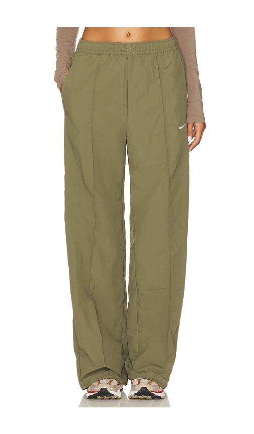nike everythings woven mid rise open hem pant in olive.