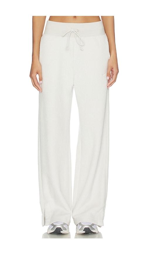 nike high waisted wide leg cozy fleece pant in ivory.