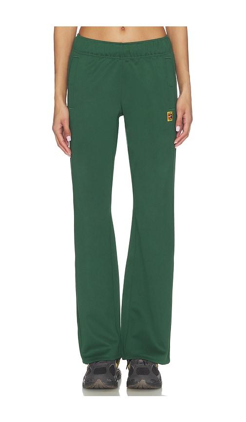nike mid rise tennis pant in green.
