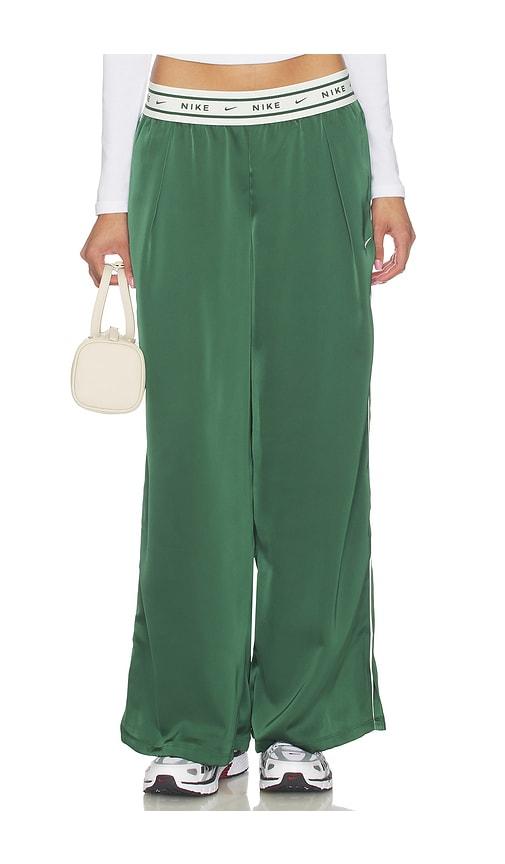 nike satin pant in dark green.