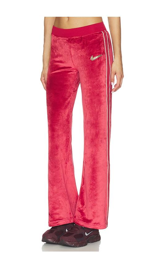nike velour pant in red.