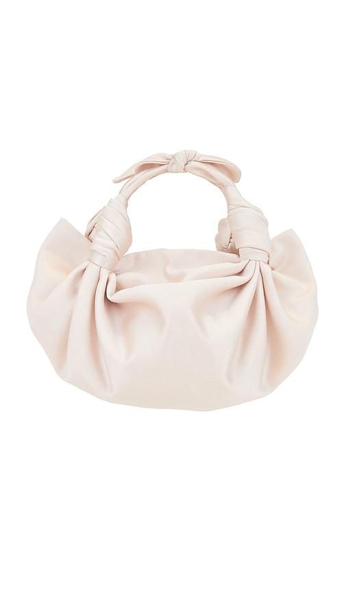 nla collection knot bag in metallic gold.