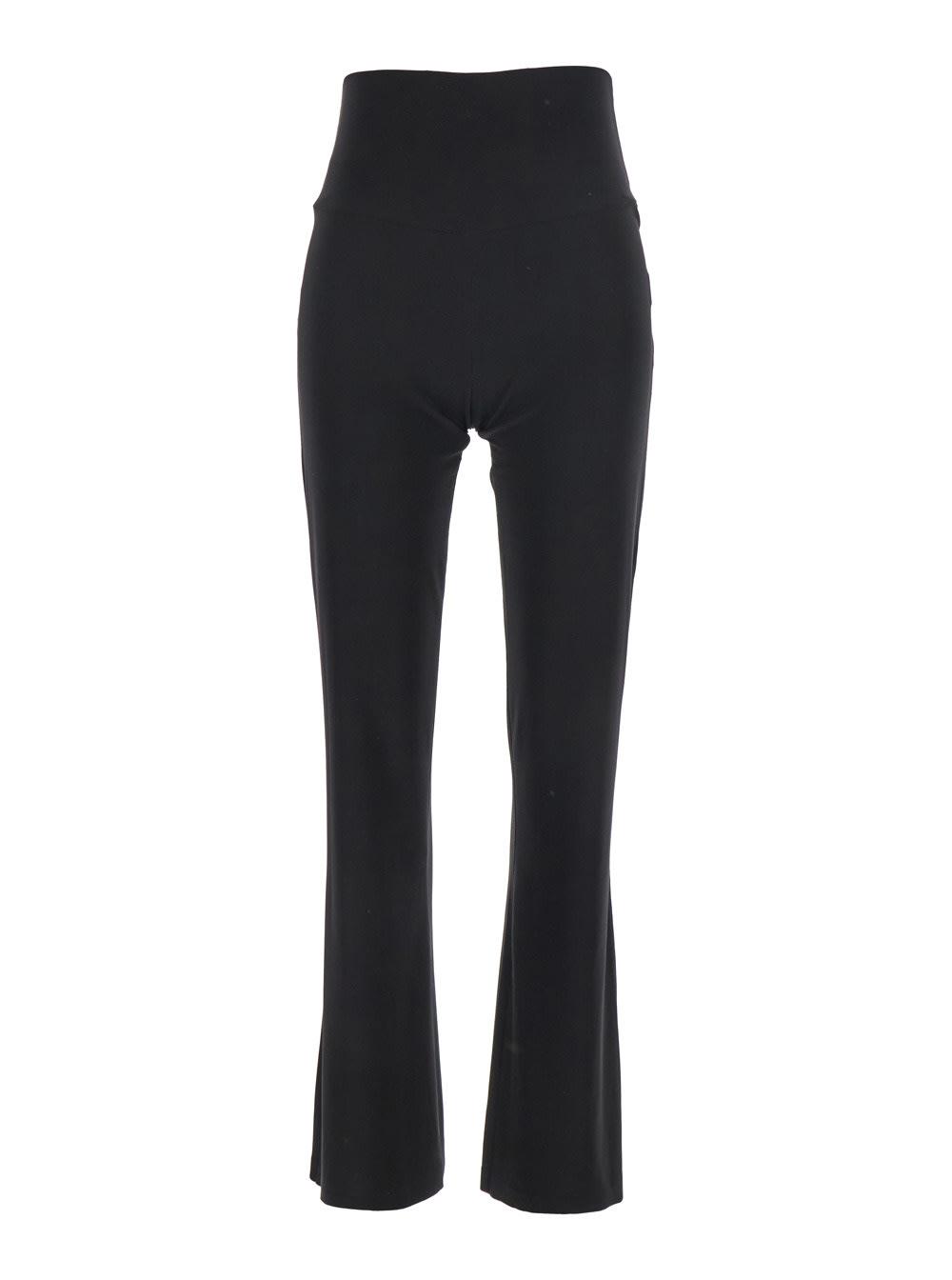norma kamali boot black pants with high waist and wide leg in tech fabric stretch woman