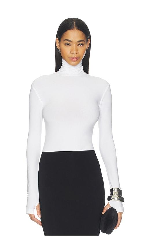 norma kamali slim fit long sleeve turtle top in white.