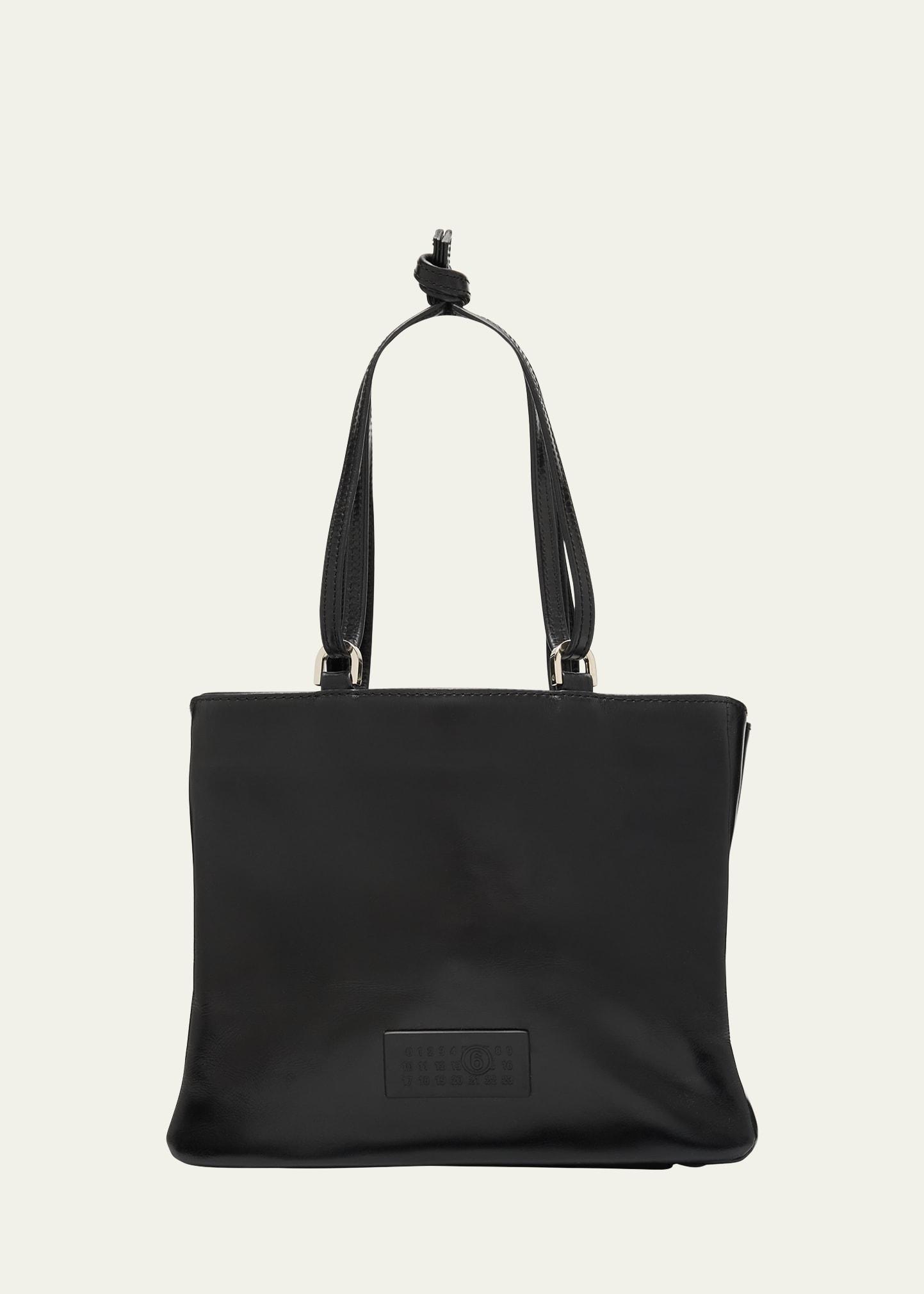 numeric east-west leather tote bag
