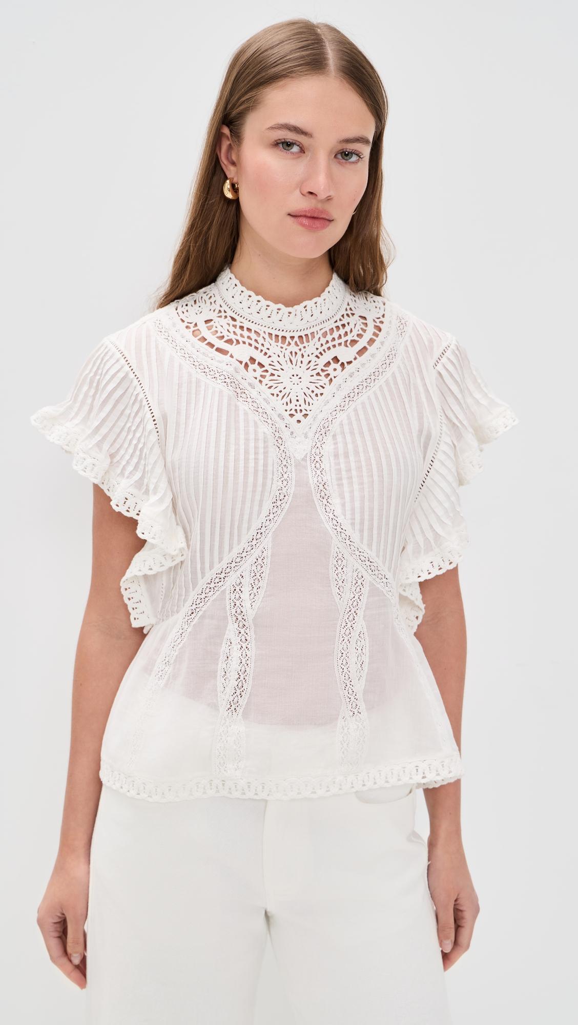 off-white blouse with appliques