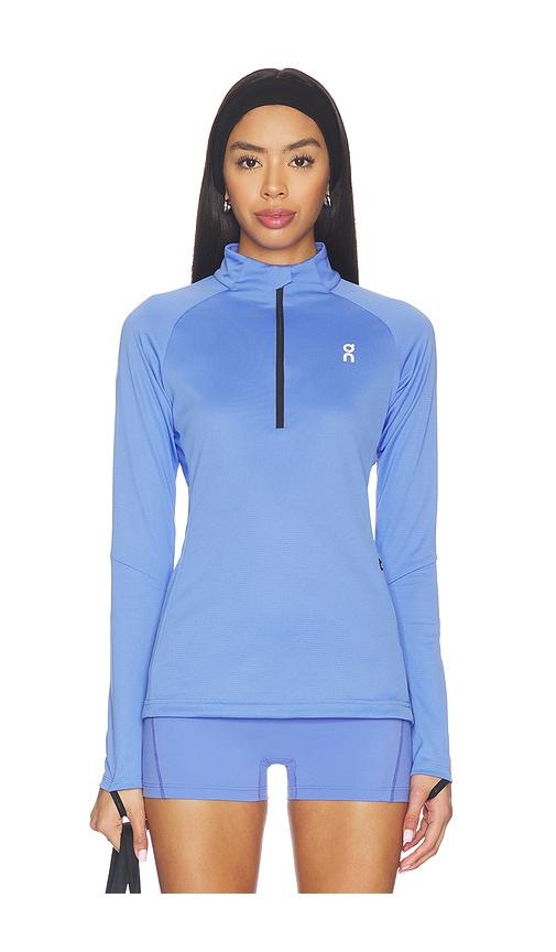 on climate shirt in blue.